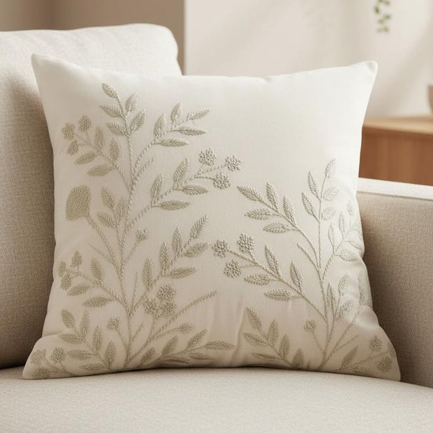 Cream floral embroidered cushion cover from Starlight Express, soft furnishings with intricate floral embroidery design.