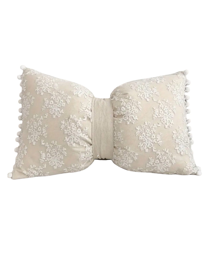 Cream neutral lace bow cushion from Starlight Express, featuring soft furnishings with delicate lace and a decorative bow detail.