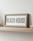 Rustic wooden framed wall art sign with beach house design by Brayden and Brooks, perfect for coastal home decor.