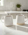 Gallery Direct reactive glaze bee mug for kitchen and dining, featuring a colorful bee design on ceramic mug.