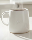 Gallery Direct reactive glaze bee mug for kitchen and dining, featuring a colorful bee design on ceramic.