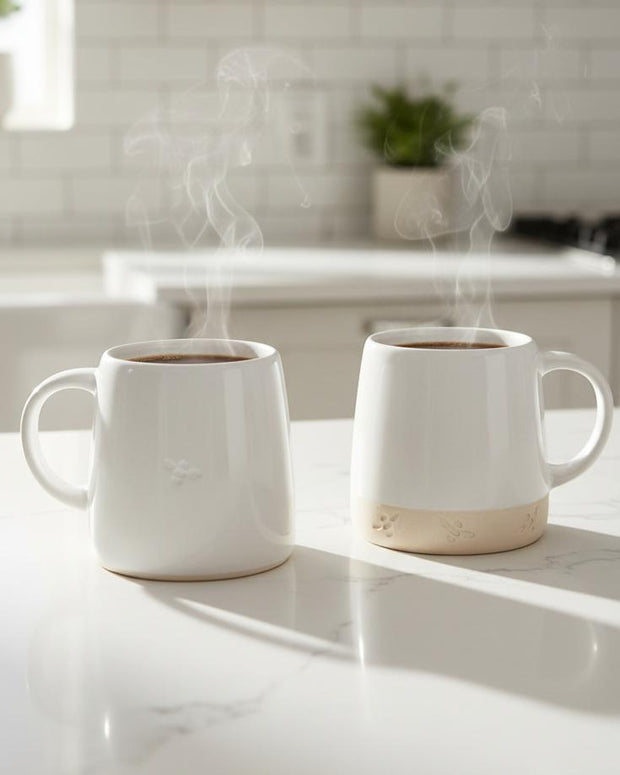 Gallery Direct reactive glaze bee mug for kitchen and dining, featuring a colorful bee design on ceramic mug.
