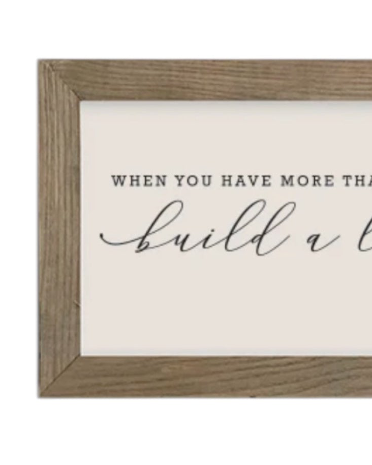 Rustic wooden wall art sign by Brayden and Brooks with a medium frame that reads 