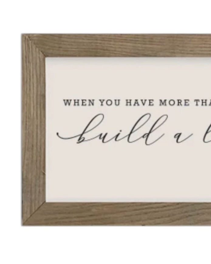 Rustic wooden wall art sign by Brayden and Brooks with a medium frame that reads 