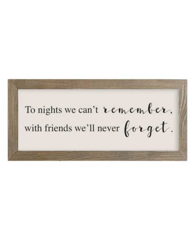 Rustic wooden framed wall art sign by Brayden and Brooks with the quote "To nights we can't remember with friends we'll never forget."