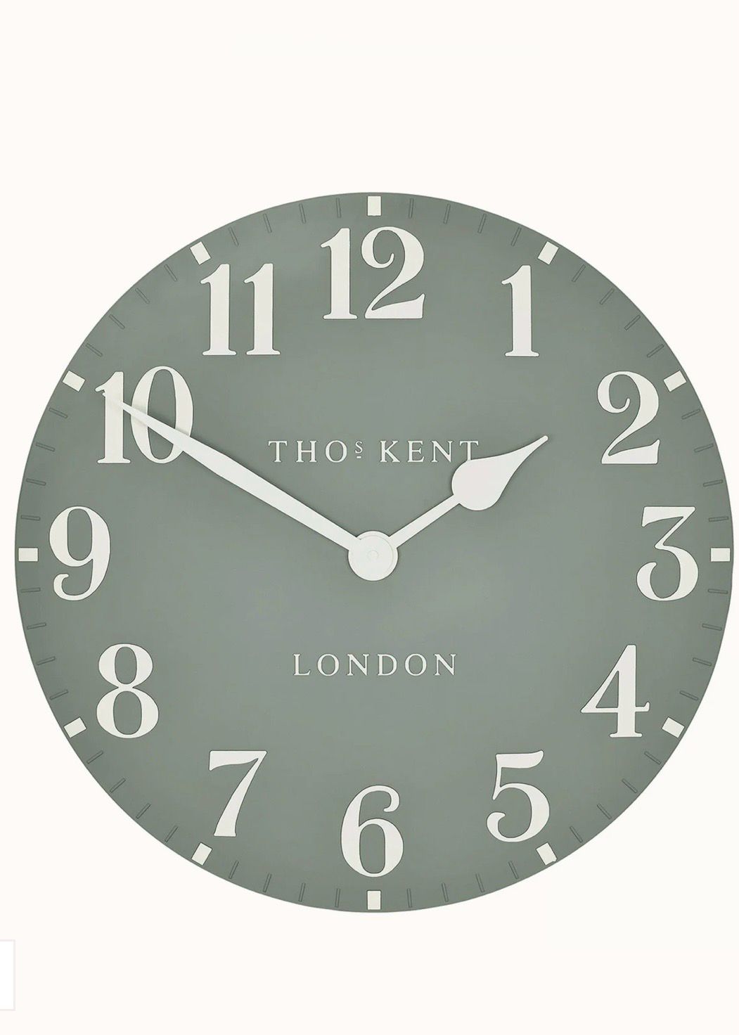 Gallery Direct Thomas Kent 12-inch Arabic wall clock in seagrass green with bold black Arabic numerals and modern design.