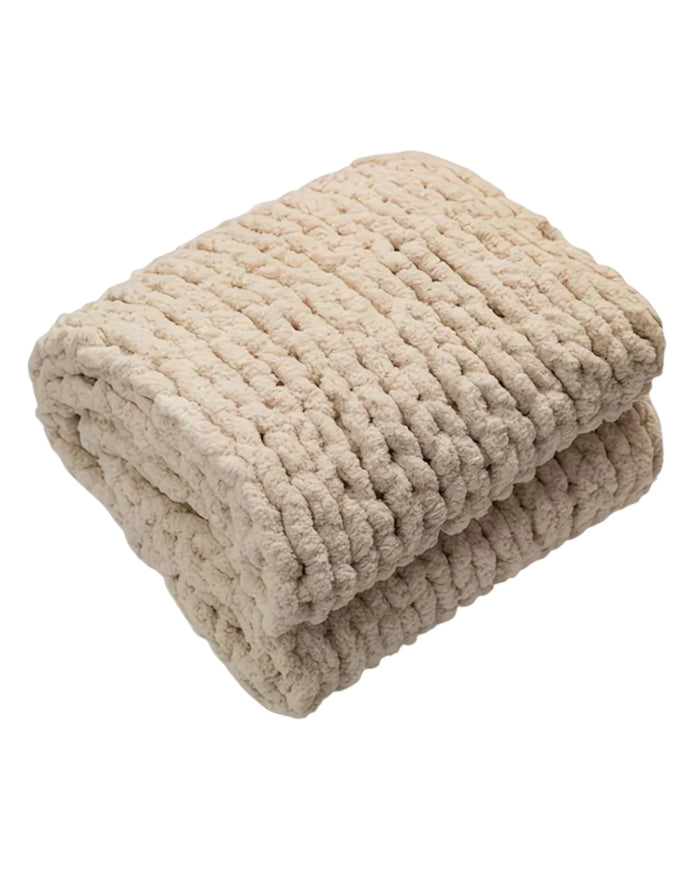 Cream chenille chunky knit blanket throw by Starlight Express, showcasing its soft, cozy texture and plush knit design.