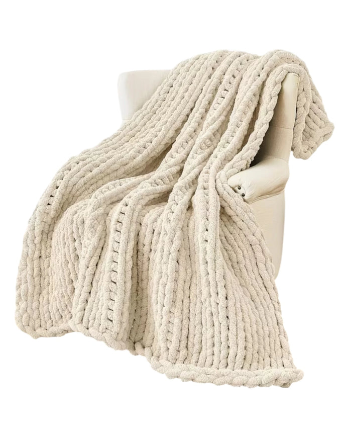 Cream chenille chunky knit blanket throw from Starlight Express, showcasing soft, cozy woven texture for comfortable home decor.