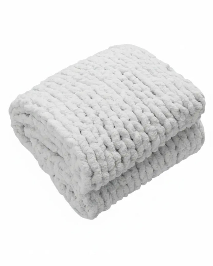 White chenille chunky knit blanket throw from Starlight Express, showcasing soft, cozy woven texture for home furnishings.