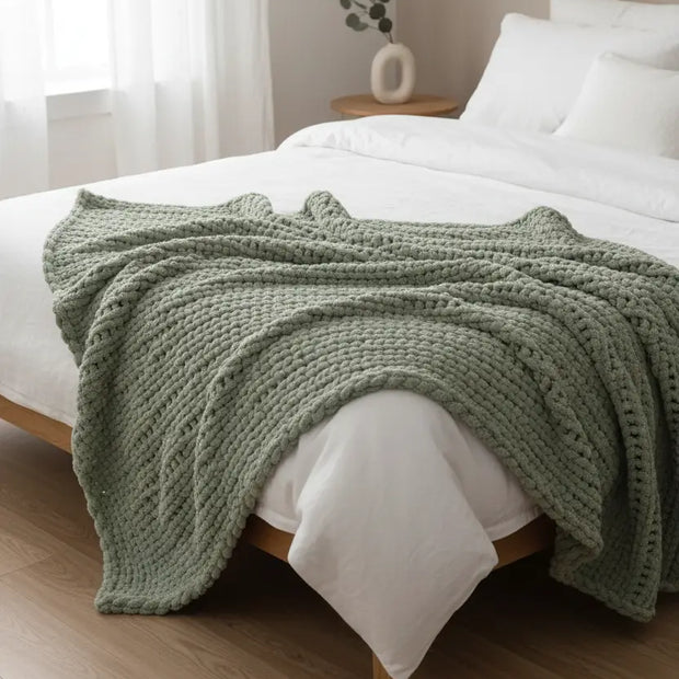 Sage green chunky chenille knit throw blanket by Starlight Express, soft and cozy for home decor and comfort.