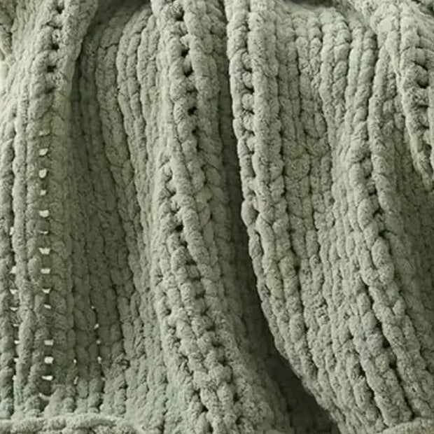 Sage green chunky chenille knit throw blanket from Starlight Express, soft and cozy home furnishings for living space decor.