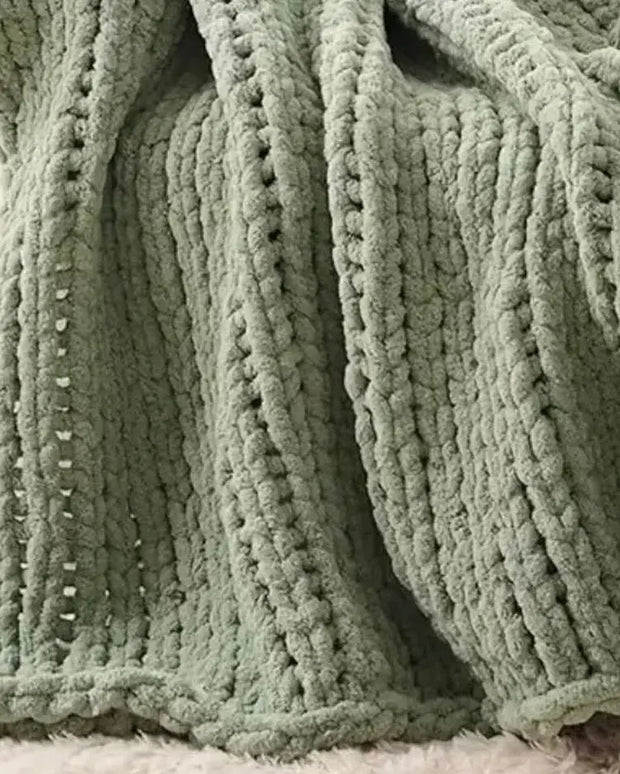 Sage green chunky chenille knit throw blanket from Starlight Express, soft and cozy home furnishings for living space decor.