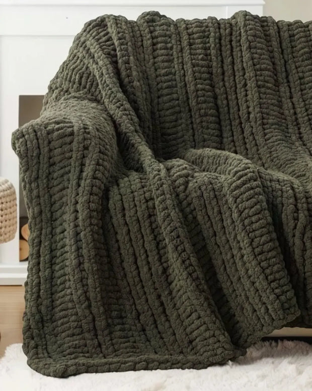 Olive green chunky chenille knit throw blanket from Starlight Express, soft and cozy furnishings for living room or bedroom.