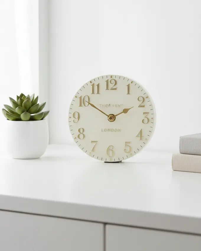 Gallery Direct Thomas Kent 6-inch Arabic mantle clock in oatmeal white with black numerals and classic design.