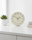 Gallery Direct Thomas Kent 6-inch Arabic mantle clock in oatmeal white with black numerals and classic design.