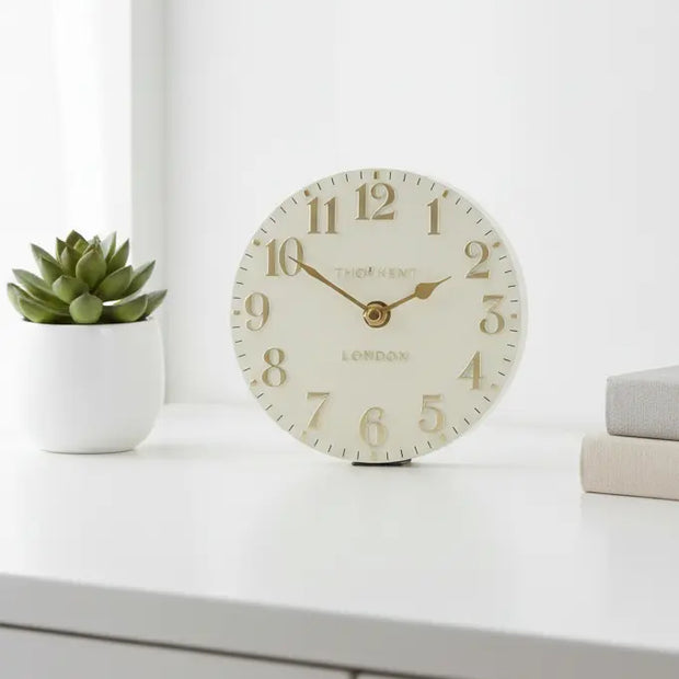 Gallery Direct Thomas Kent 6-inch Arabic mantle clock in oatmeal white with black numerals and classic design.