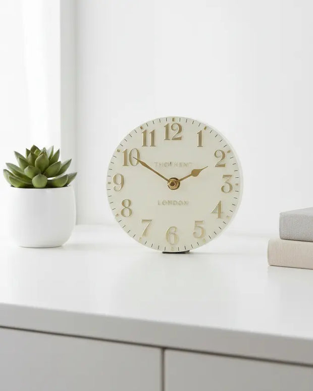 Gallery Direct Thomas Kent 6-inch Arabic mantle clock in oatmeal white with black numerals and classic design.