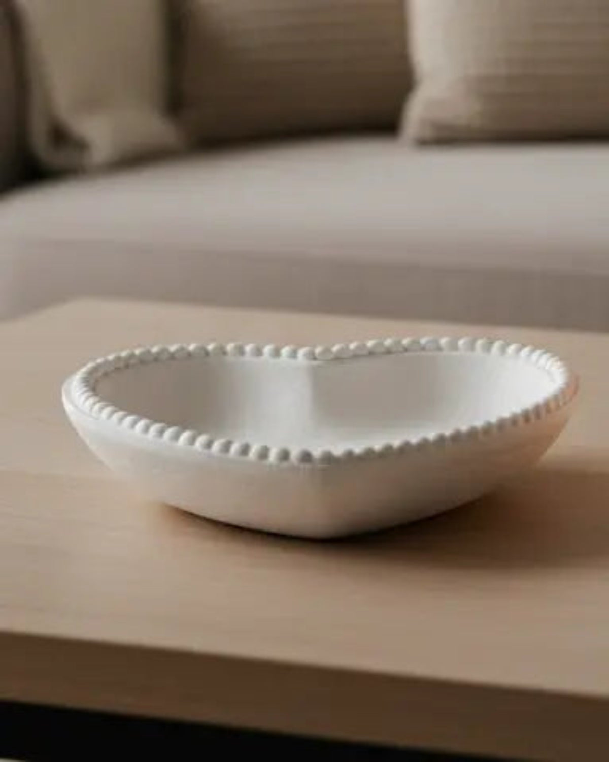 White wooden heart-shaped bobble bowl by Heaven Sends, featuring a smooth polished surface and decorative heart design.