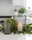 Set of two Rust Wire Hurricane Candle Holders for home decor, featuring rustic metal design with glass inserts by Terrace & Garden Ltd.
