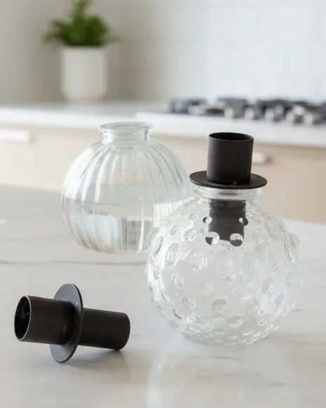 Rustic bottle candle holder insert from Terrace & Garden Ltd, suitable for home decor, with a weathered, vintage finish.
