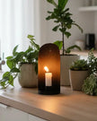 Rustic wall-mounted candle holder from Terrace & Garden Ltd for home decor, featuring a wooden and metal design.