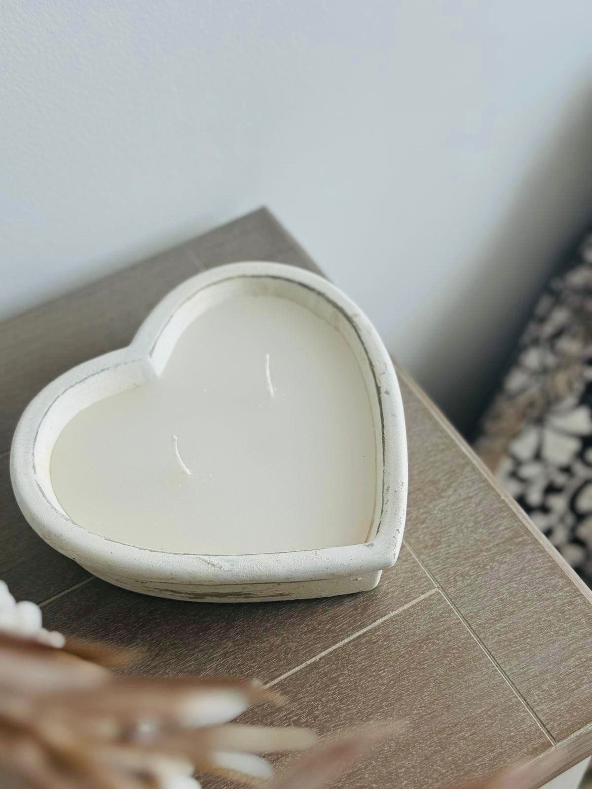 Rustic stone heart-shaped candle from Candlelight Products Ltd, showcasing a cozy, natural decor candle with textured stone design.