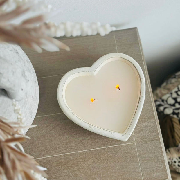 Rustic stone heart-shaped candle from Candlelight Products Ltd, showcasing a cozy and natural candle design.