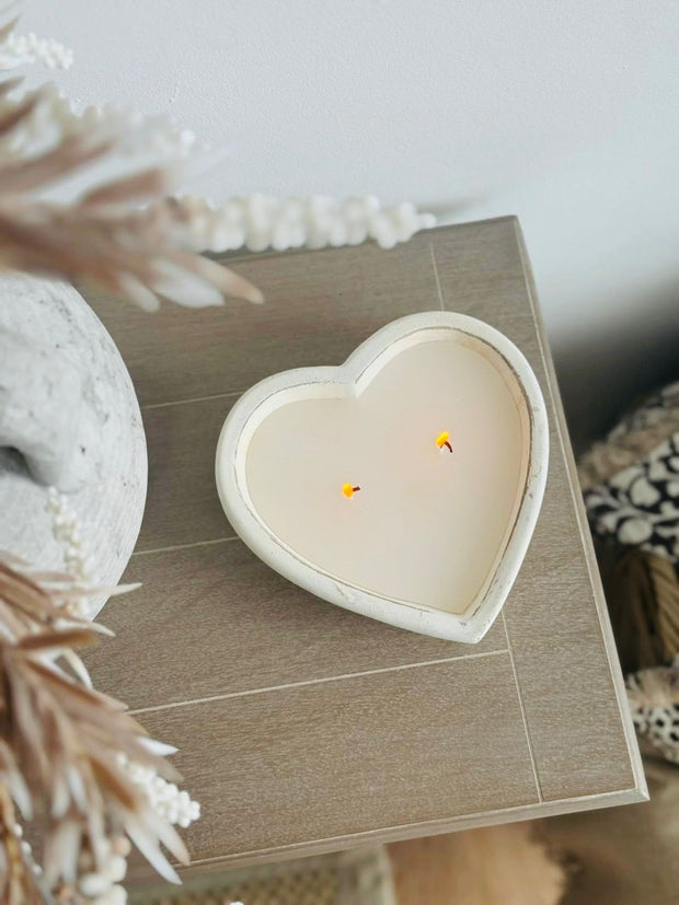 Rustic stone heart-shaped candle from Candlelight Products Ltd, showcasing a cozy and natural candle design.