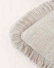 Starlight Express neutral cushion cover with frayed edge detail, made of soft furnishings fabric, displayed on a neutral background.