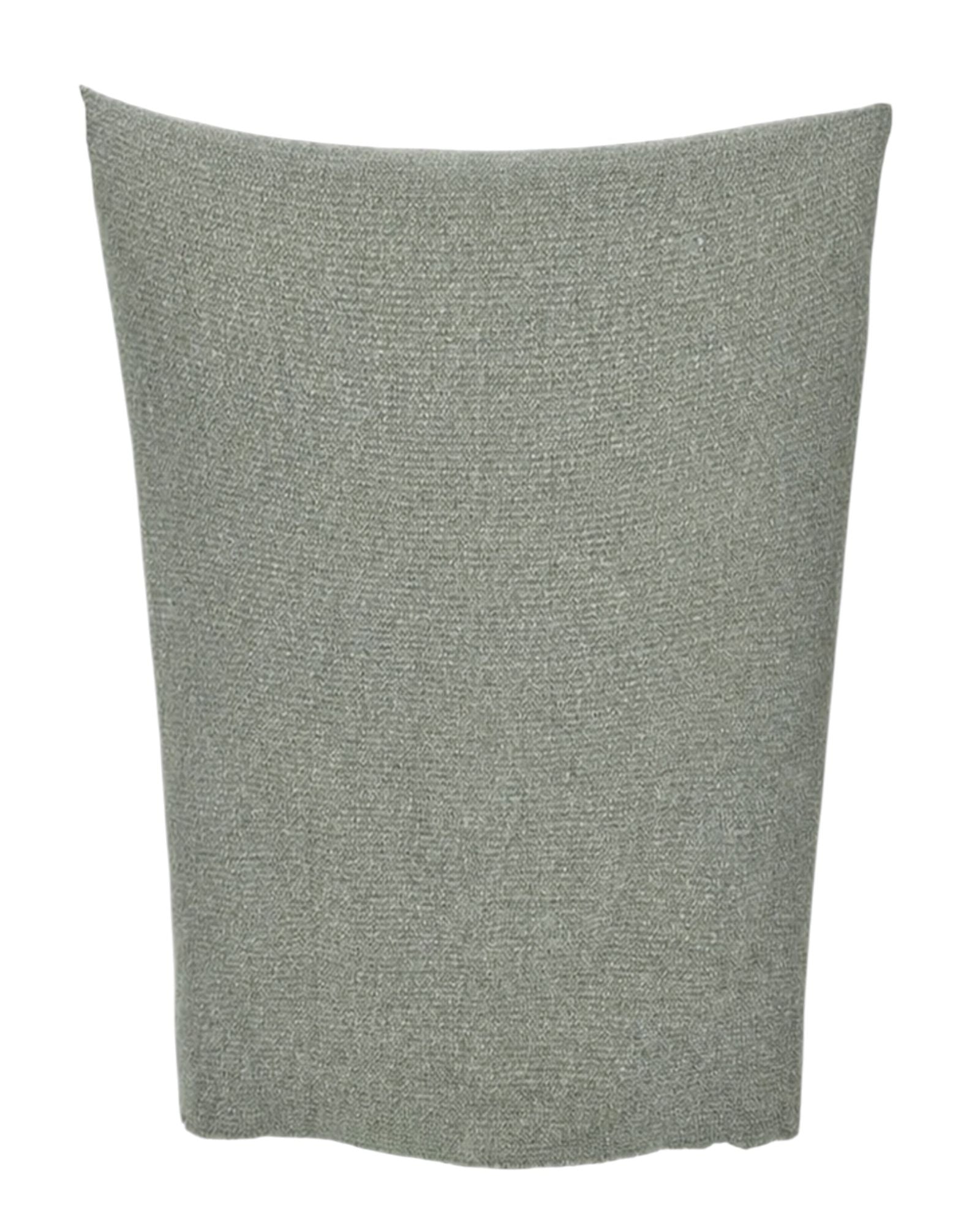 Malini Stello Tactile Green Blanket Throw showcasing soft, cozy fabric with textured surface for comfortable lounging.