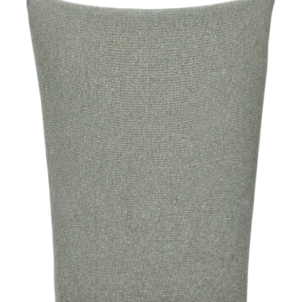 Malini Stello Tactile Green Blanket Throw showcasing soft, cozy fabric with textured surface for comfortable lounging.