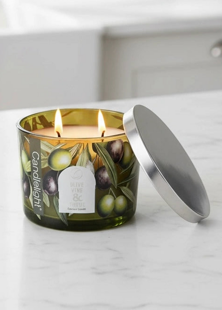Olive vine and thyme scented candle with metal lid from Candlelight Products Ltd, shown in a glass jar.