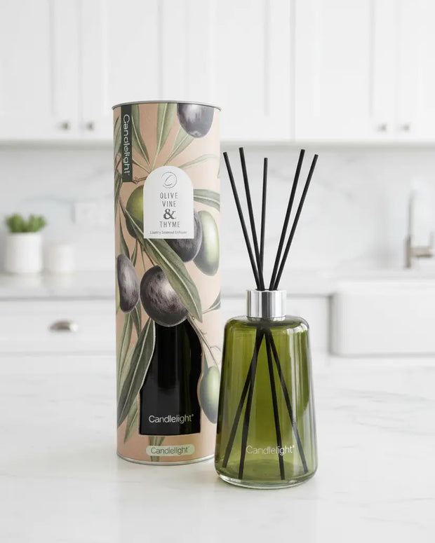 Reed diffuser with olive vine and thyme scent in a 300ml glass bottle, home fragrance from Candlelight Products Ltd.