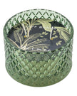 Embossed green glass candle with Corsia Scent by Candlelight Products Ltd, showcasing a stylish decorative candle.