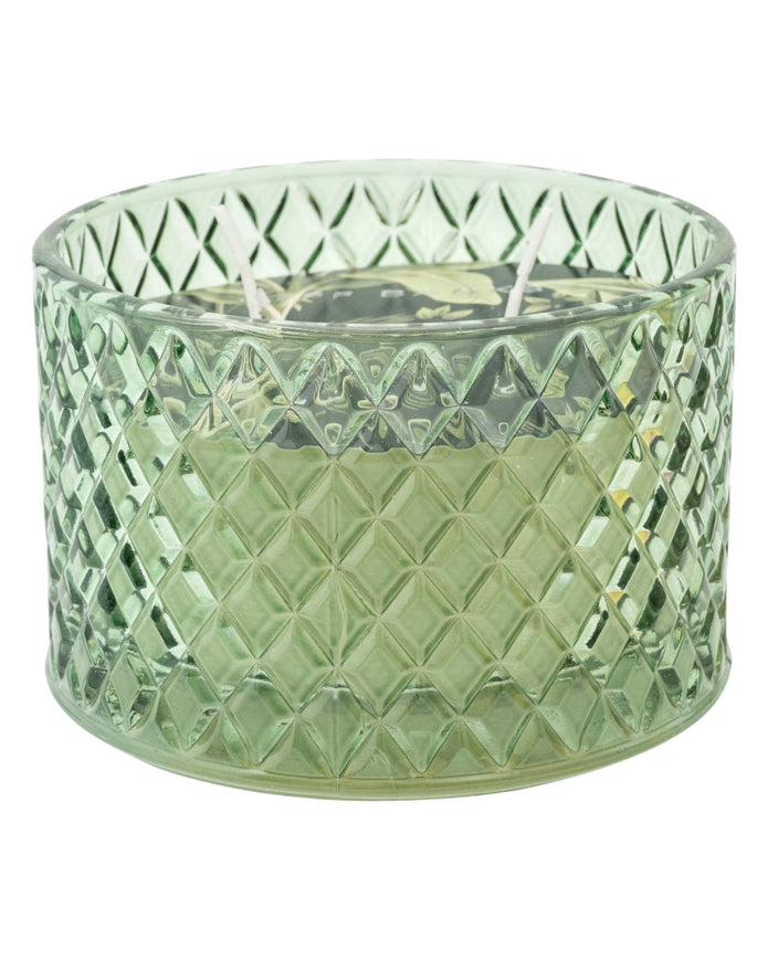 Embossed green glass candle with Corsia scent by Candlelight Products Ltd, showcasing a decorative scented candle.