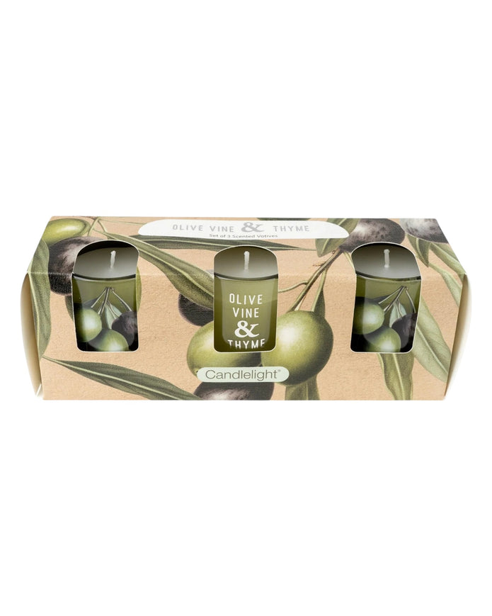 Set of 3 Olive Vine and Thyme scented votive candles by Candlelight Products Ltd, with green and beige wax in glass holders.