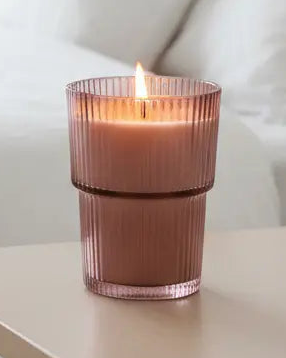 Large ridged glass candle featuring Garden Blooms Plum scent by Candlelight Products Ltd, with a decorative floral design.