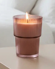Large ridged glass candle featuring Garden Blooms Plum scent by Candlelight Products Ltd, with a decorative floral design.