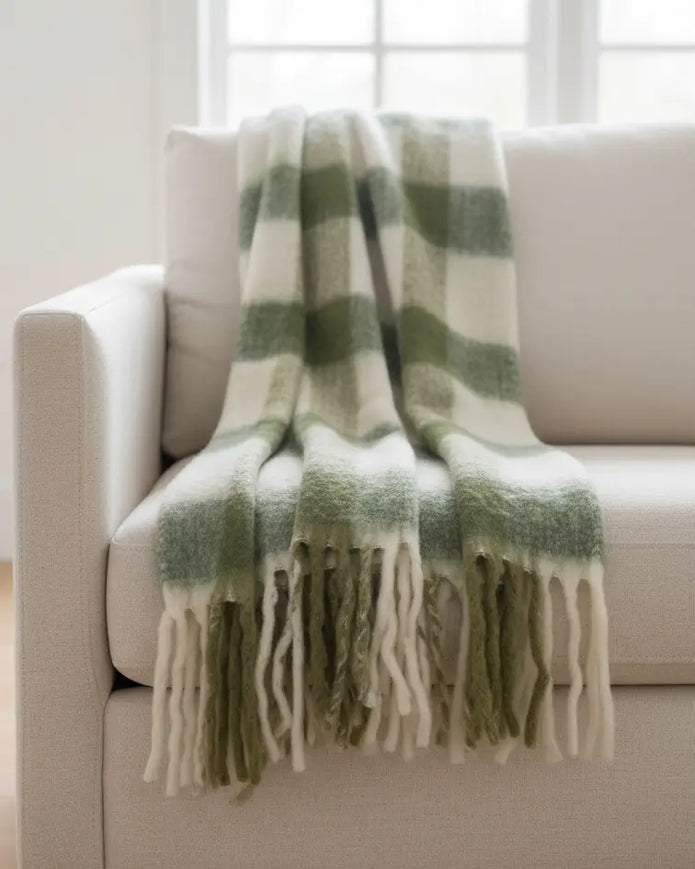 Olive green checked tassel cosy throw blanket by Gisela Graham, soft furnishings with tassel details on textured fabric.