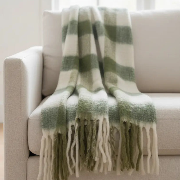 Olive green checked tassel cosy throw blanket by Gisela Graham, soft furnishings with tassel details on textured fabric.