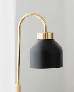Black candle warmer lamp with shade from Starlight Express, showcasing safe flameless lighting and decorative design.