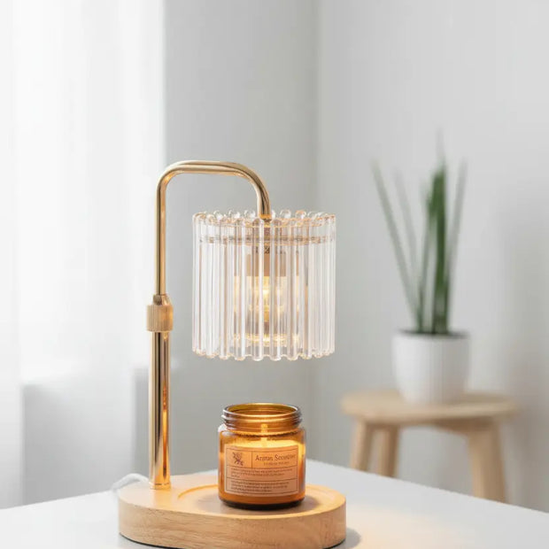 Clear glass ribbed candle warmer lamp by Starlight Express, featuring a safe flameless design and timer for cozy lighting.