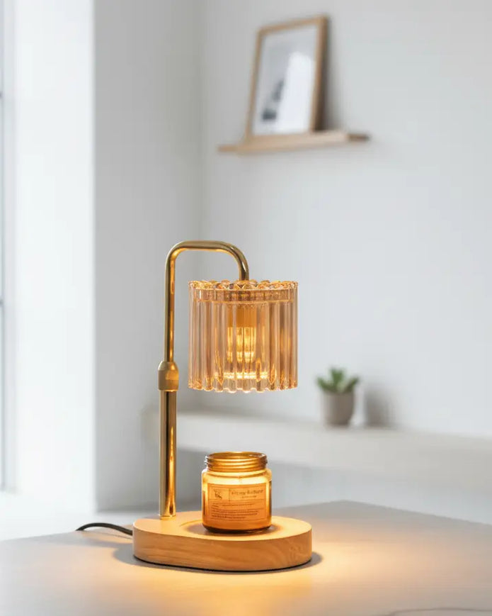 Clear glass ribbed candle warmer lamp by Starlight Express, a safe flameless lighting device with a timer feature.