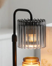 Black glass candle warmer lamp by Starlight Express with safe flameless timer, designed for gentle, ambient lighting.
