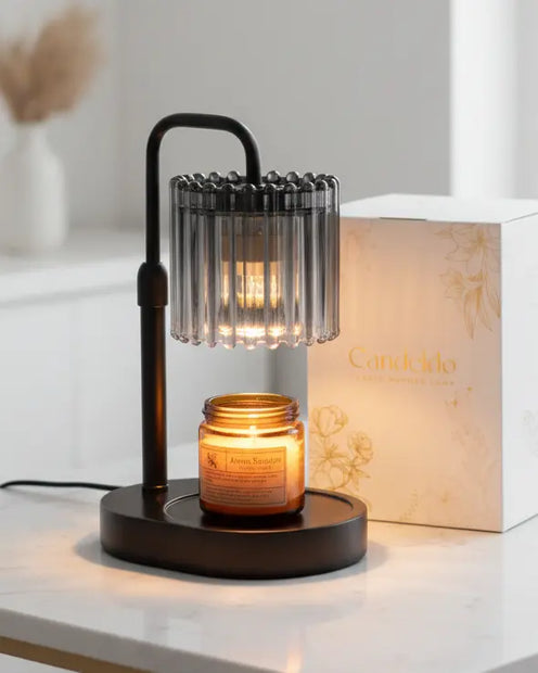 Black glass candle warmer lamp from Starlight Express with safe flameless lighting and timer feature, designed for ambient home use.