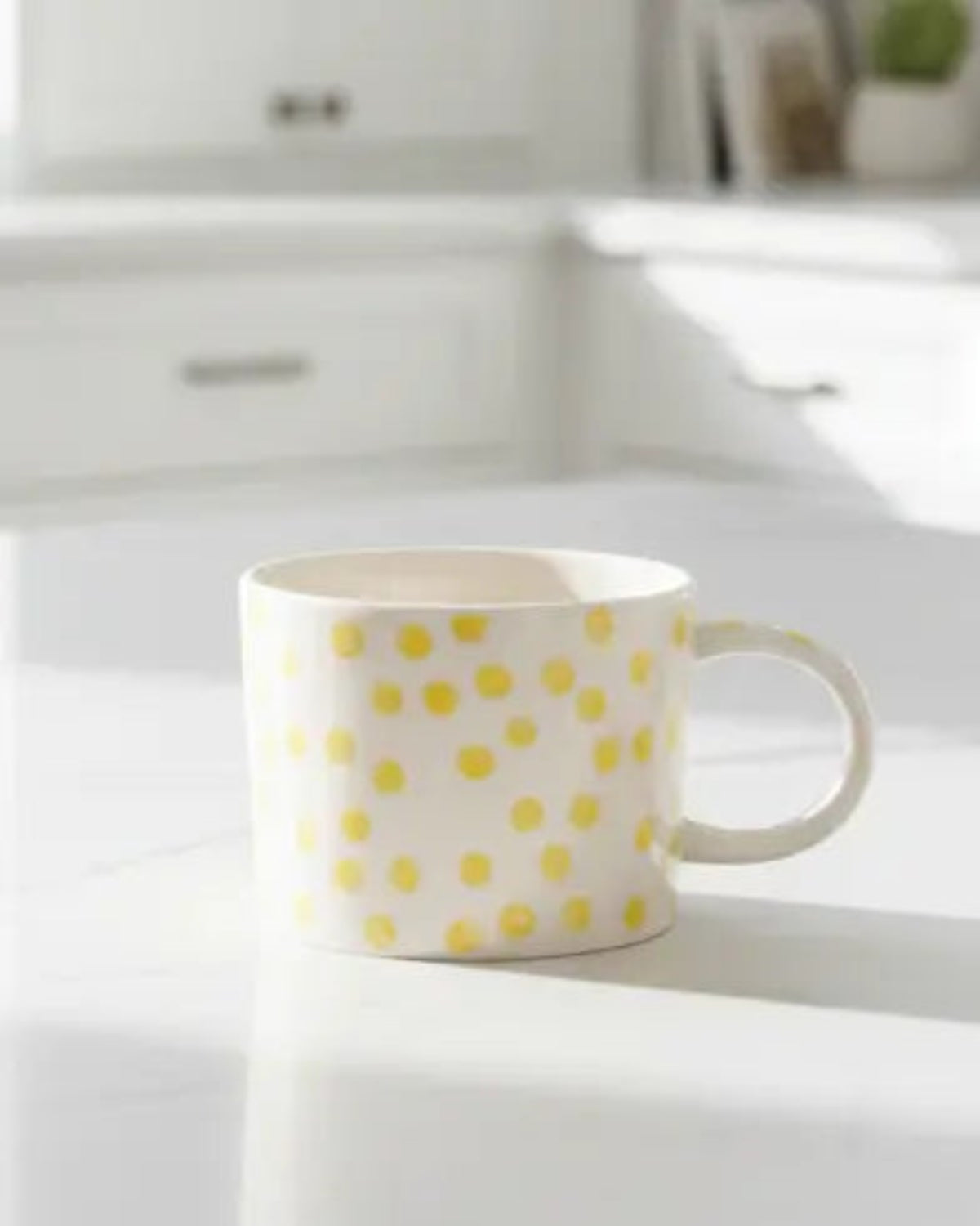 Gisela Graham yellow dotted stoneware mug for kitchen and dining, featuring a bright yellow dotted design with a smooth ceramic finish.