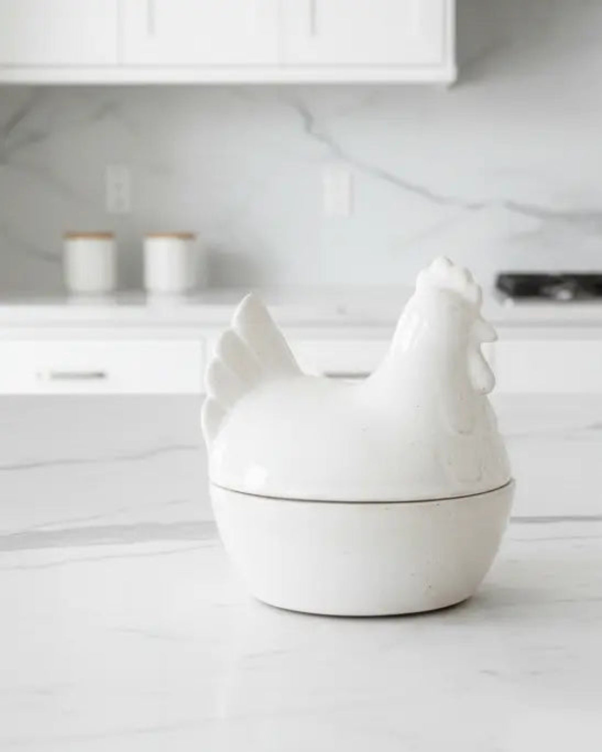 White ceramic hen egg holder with lid from Wikholmform, designed for kitchen and dining use, featuring a charming hen shape.