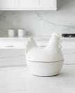 White ceramic hen egg holder with lid from Wikholmform, designed for kitchen and dining use, featuring a charming hen shape.