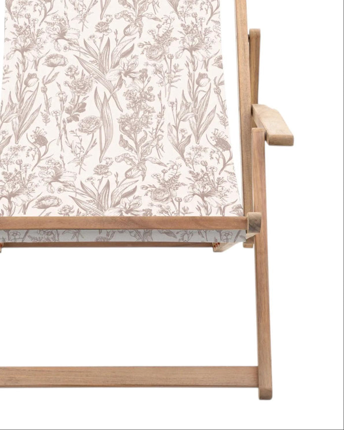 Creta wooden floral deck chair in beige from Gallery Direct, showing a stylish garden furniture piece with a floral design.