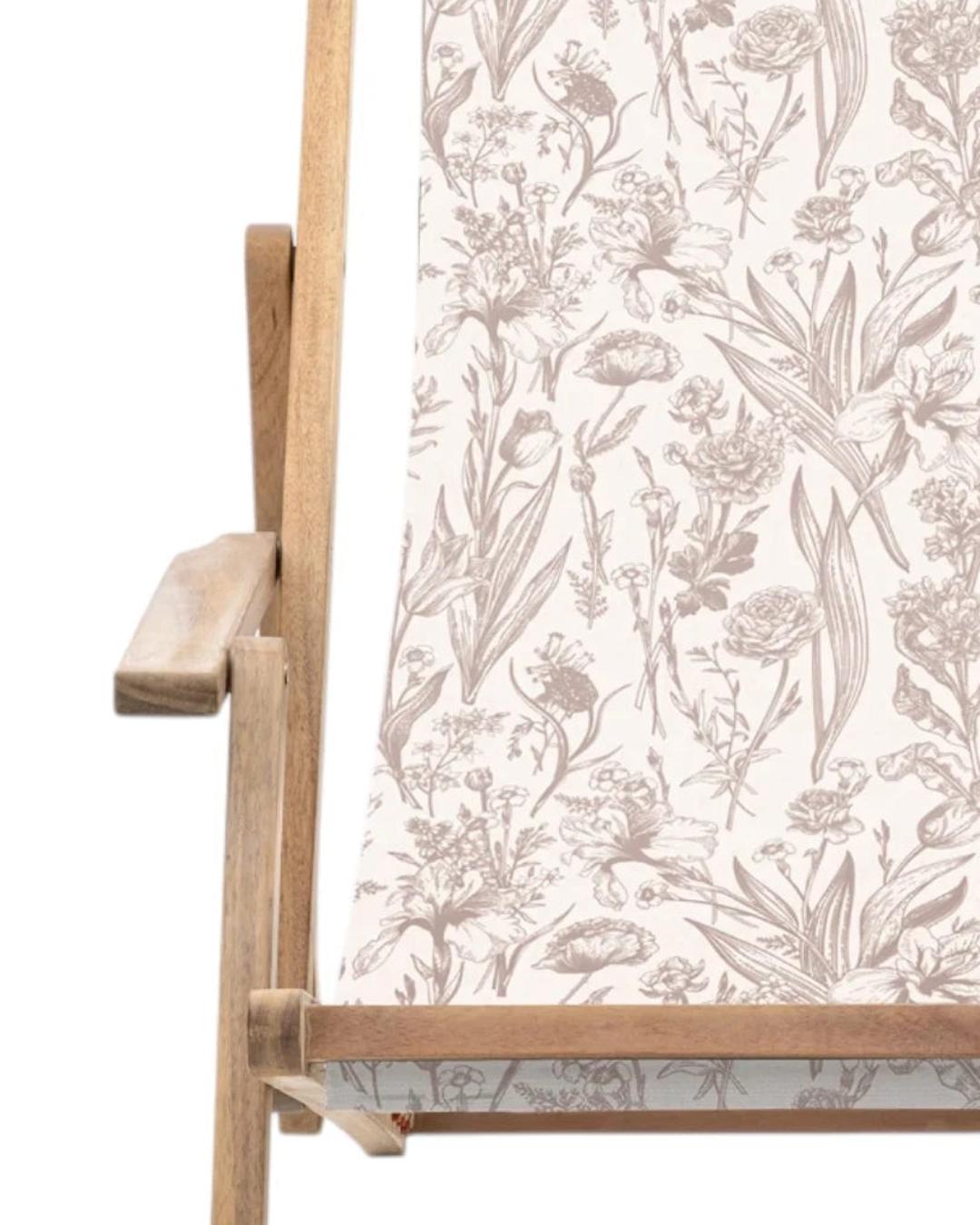 Creta wooden floral deck chair in beige from Gallery Direct, showing a stylish garden furniture piece with floral design.
